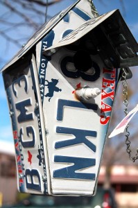 Birdhouse made of old license plates