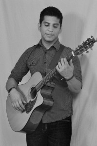 Josue Marquez, NMSU Journalism student who sings and plays guitar in Okazuri every weeken.