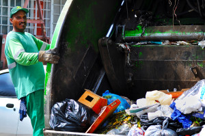 Daniel Tonche manually disposes people’s garbage into a truck that goes around the southern area of Ciudad Juárez.