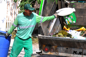 Daniel Tonche has to chase the garbage truck to dispose what's inside people's trash containers.