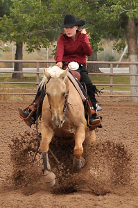 Freshman Katherine Arnold wins the point for NMSU with a score of 68.5 in the Western Reining portion of NMSU’s Equestrian competion against the Southern Methodist University Mustangs in October.